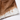 BROWN COWHIDE DENIM™ JORT — brown and ivory hair-on cowhide texture and hem detail