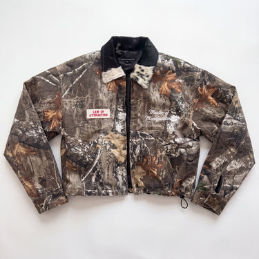 CAMO MANIFESTATION MASTER CROP — front studio flat showing cowhide collar and chest embroidery