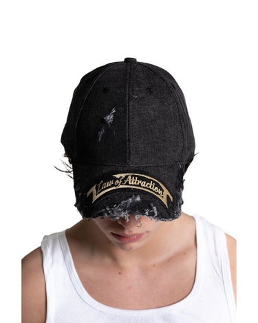 Washed Black Law of Attraction Selvedge Denim Cap — On-head fit