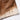 BROWN COWHIDE DENIM™ JORT — brown and ivory hair-on cowhide texture and hem detail