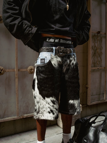 LOA boxer waistband visible above cowhide shorts